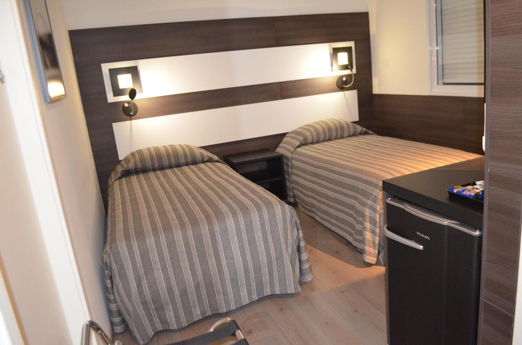 Prix Hotel Passo Fundo Quarto foto